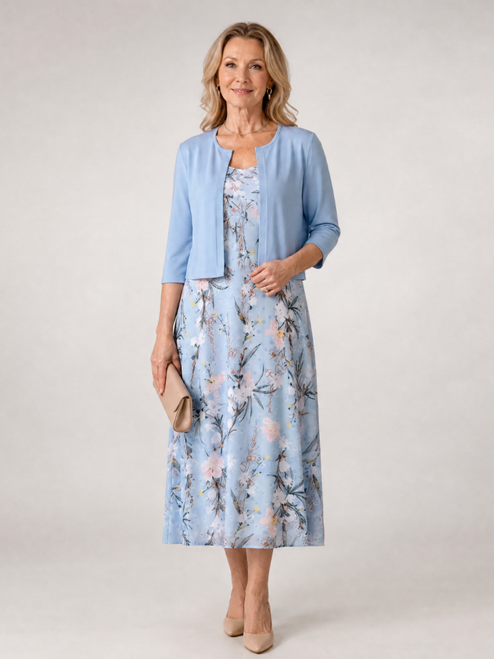 Women's floral print sleeveless midi dress with matching cropped jacket, a perfect two-piece set for spring.