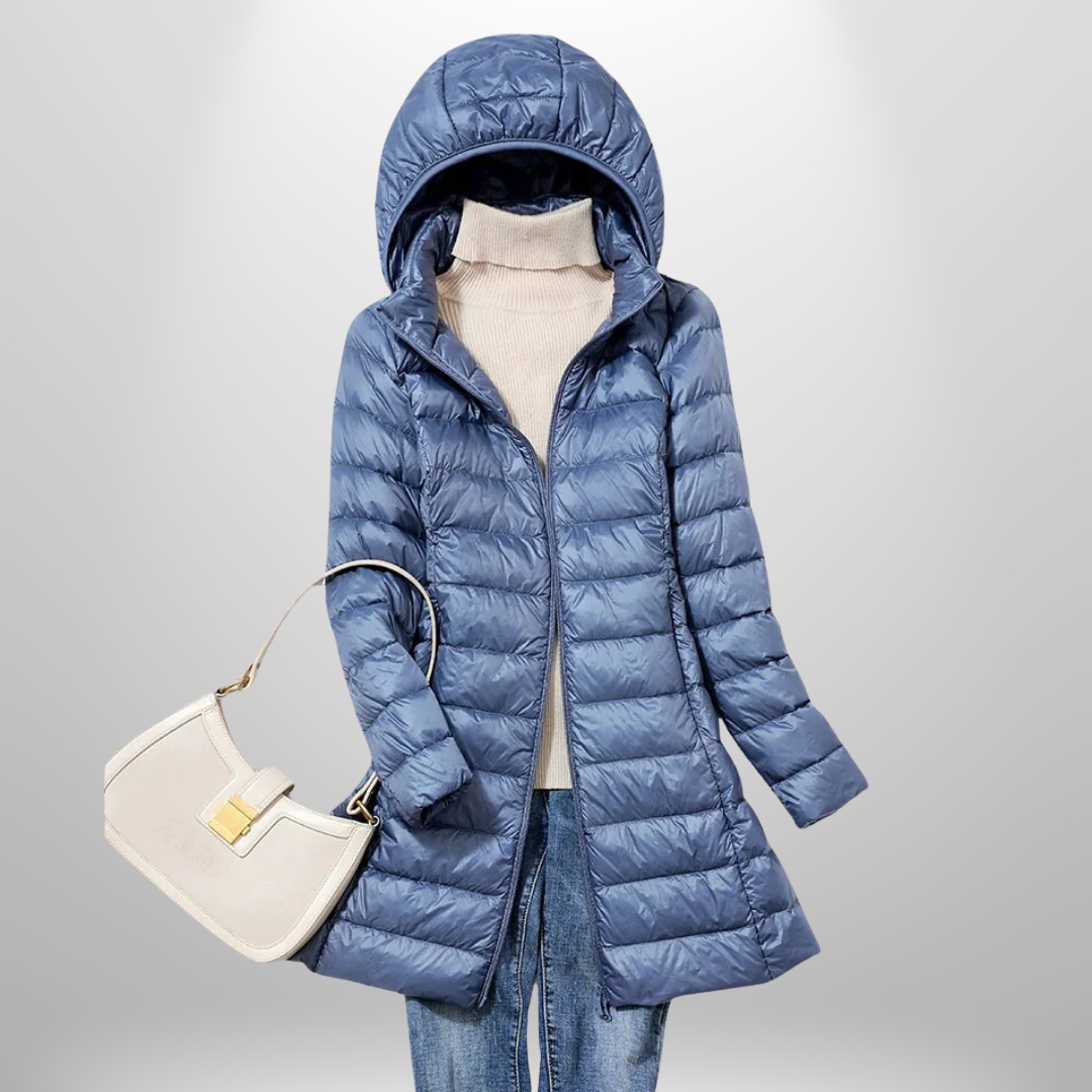 Packable women's lightweight puffer jacket, cozy & warm for travel. Perfect versatile autumn/winter outerwear.