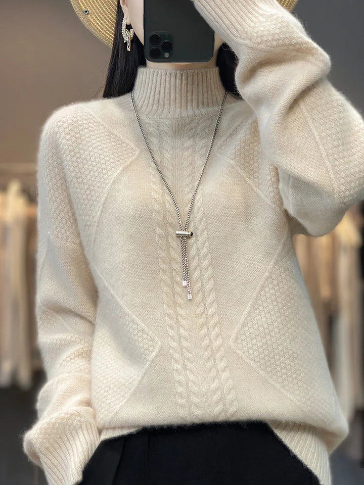 Women's soft cashmere roll neck jumper, elegant cable knit pattern for warmth and style.