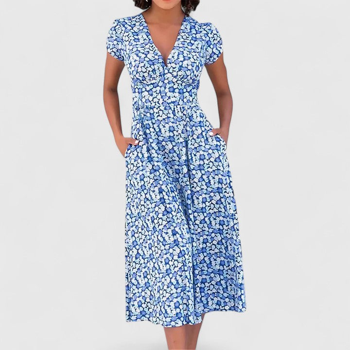 Elegant women's flowy midi dress with a heart neckline, perfect for comfortable summer wear or parties.