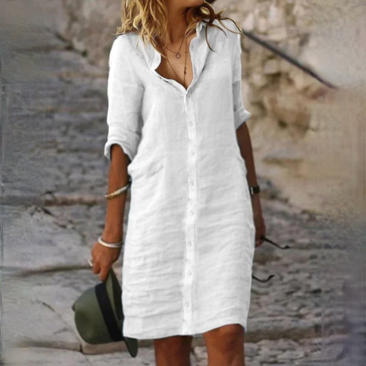 Elegant women's midi dress, perfect for everyday comfort & chic casual summer wear. Versatile & comfortable.