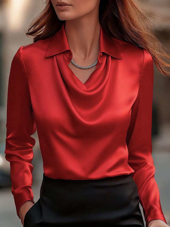 Chic women's workwear blouse: long-sleeve satin top with a flattering draped neckline.