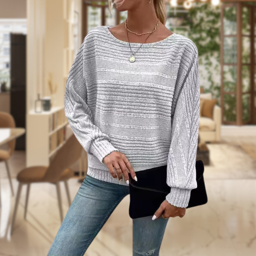Cozy women's textured knit jumper for ultimate comfort. Stylish long sleeve top, ideal for daily wear and fall fashion.