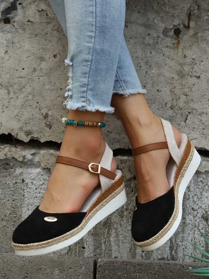 Pair of women's orthopedic woven sandals in a neutral color, offering exceptional cushioned comfort & foot support.