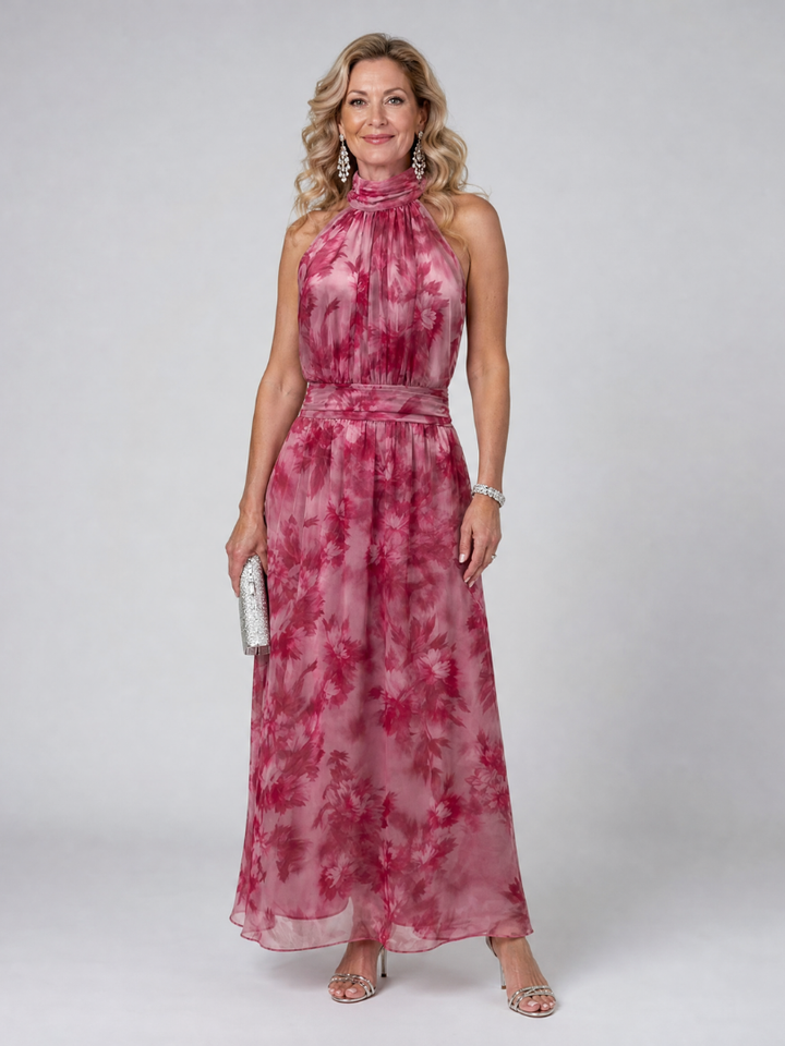 Elegant women's halter neck midi dress, perfect for parties & special occasions. Chic sleeveless design.