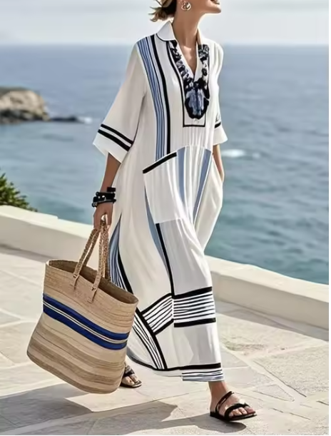 Stylish plus size women's summer maxi dress with striped patchwork details, loose fit, short sleeve.