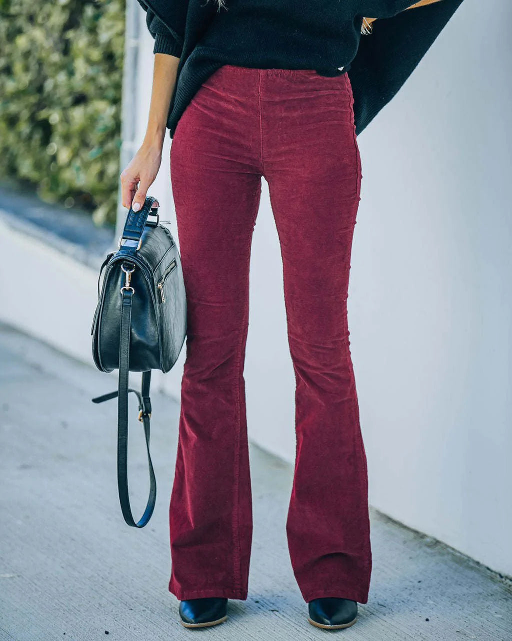 Full-length front view of women's ultra-comfort stretchy flare pants, emphasizing the flattering fit and stylish silhouette.