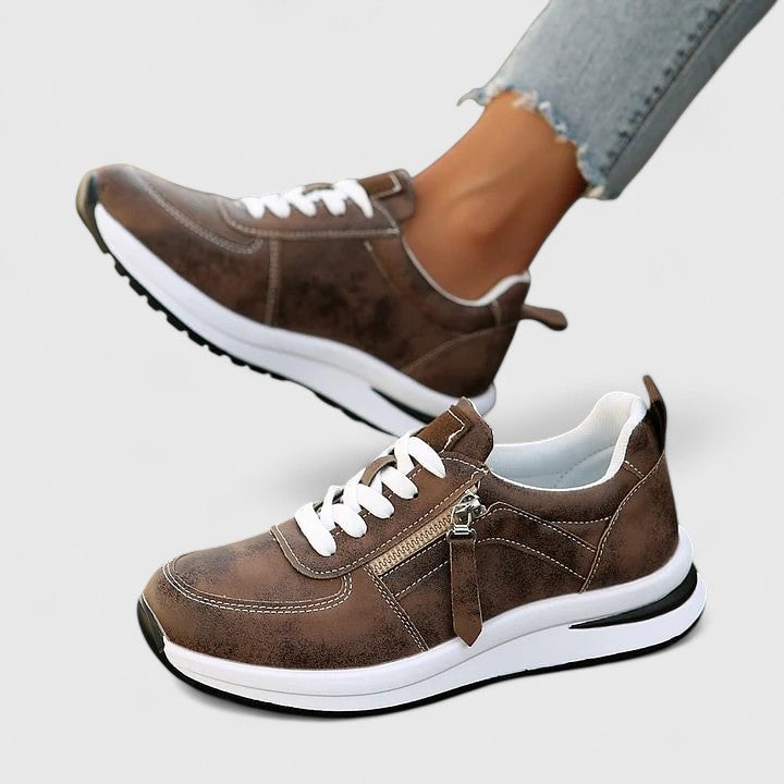 Fashionable women's sneakers with arch support, ideal for casual wear, ensuring comfort and stability.