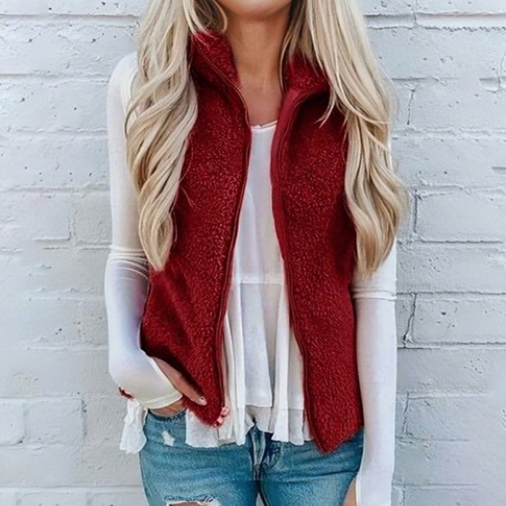 Essential women's cozy fleece vest. Lightweight, versatile, and perfect for autumn & winter layering.