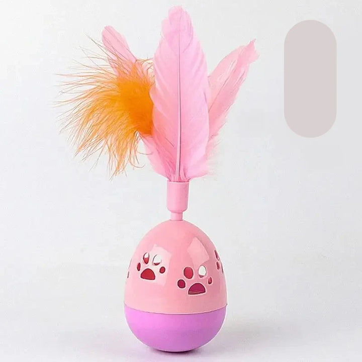 Close-up of an interactive feather cat ball toy, a durable pet supply for playful kittens.