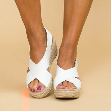 Stylish women's closed-toe wedge sandals. Lightweight summer shoes offering comfortable orthopedic support & elegance.