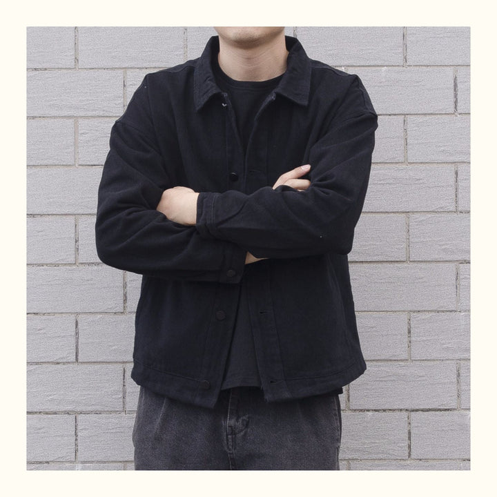 Stylish men's casual button-down jacket, ideal for layering. Comfortable relaxed fit, great for all seasons.