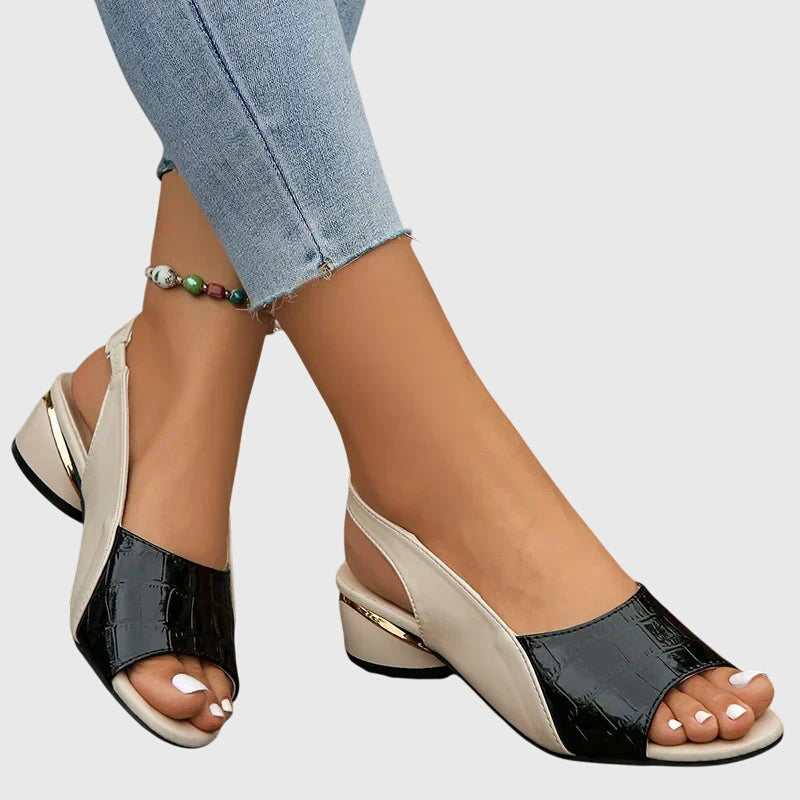 Elegant women's sandals featuring a comfortable block heel, perfect chic footwear for formal or casual outfits.