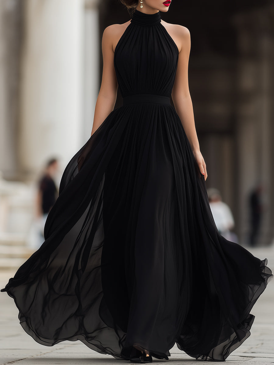 Floor-length pleated halter neck maxi dress for women, ideal for special occasions & cocktail parties.