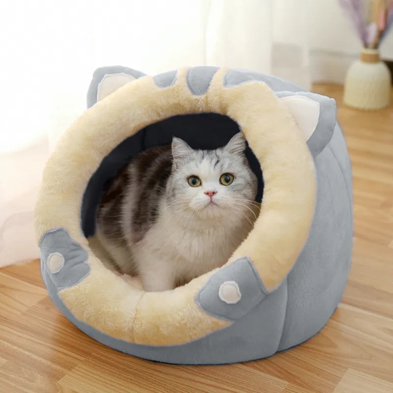 Unique cat ear design pet cave bed. Soft, cozy snuggle bed offering a warm feline retreat.