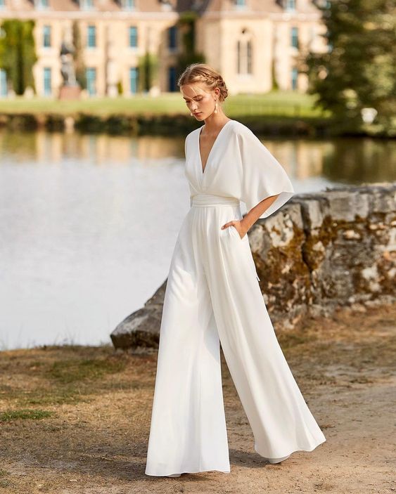 Women's relaxed fit wide leg overall jumpsuit with adjustable straps, perfect for casual everyday wear.