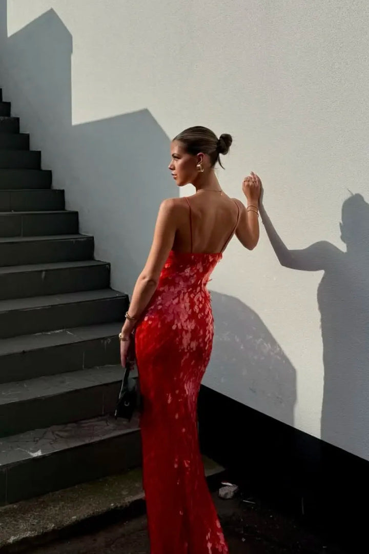 Glamorous women's red sequin mermaid maxi dress with V-neck, ideal for evening parties.