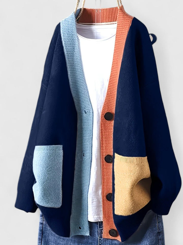 Cozy button-front women's cardigan with pockets. Stylish relaxed fit for versatile everyday layering.