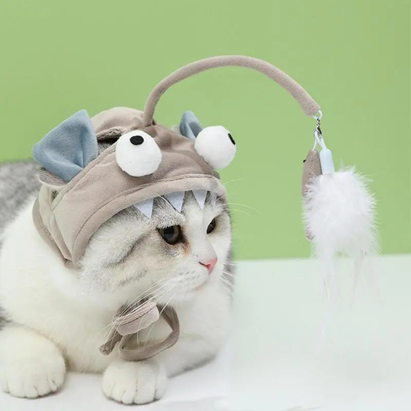 Cute cat pet costume hat featuring a feather toy for entertainment & style.