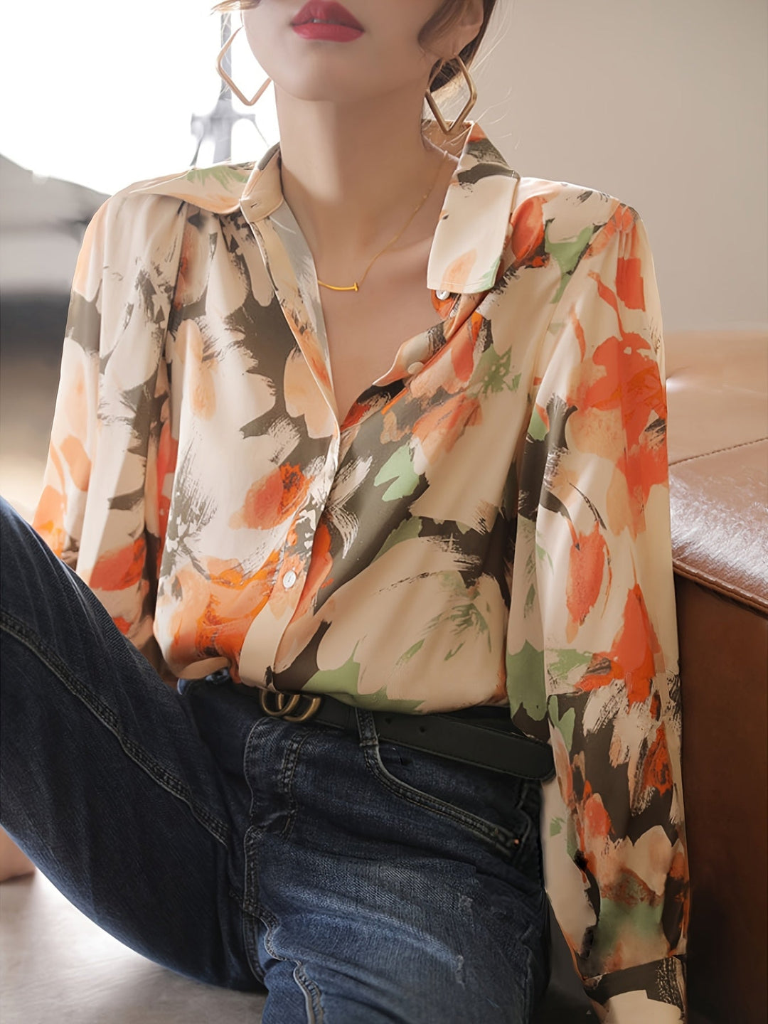 Vibrant women's floral print blouse. An elegant and comfortable top for spring fashion & summer outfits.
