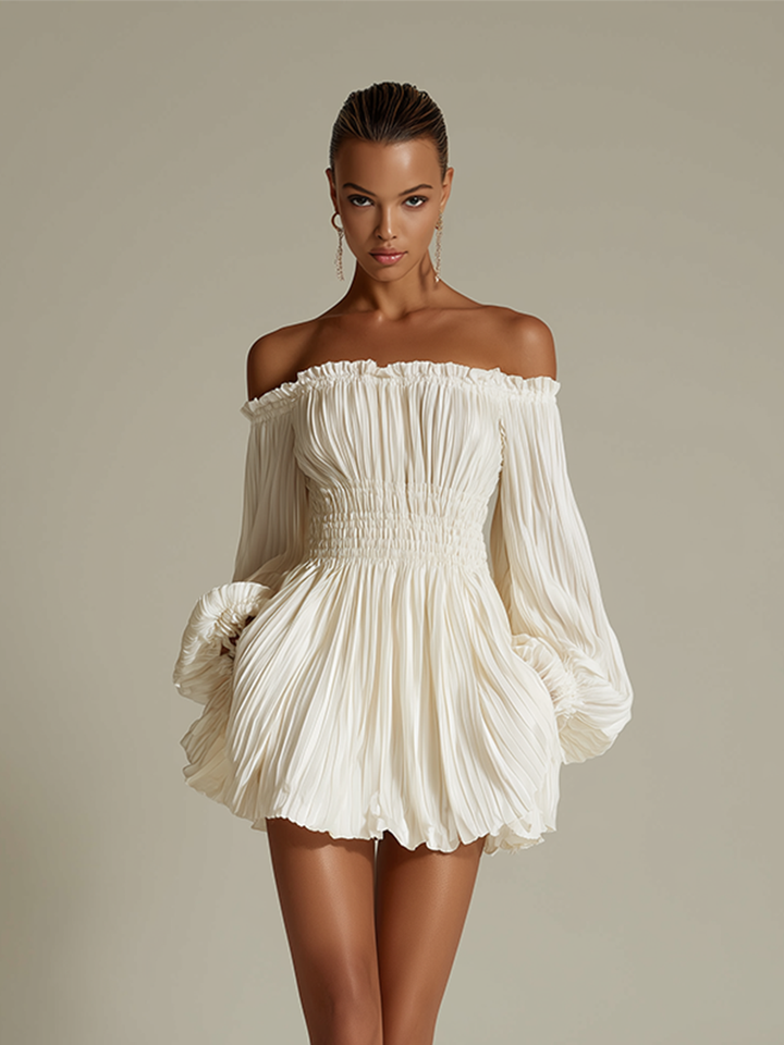 Women's white pleated mini dress with an off-shoulder Bardot neckline; a fashionable choice for any elegant party.