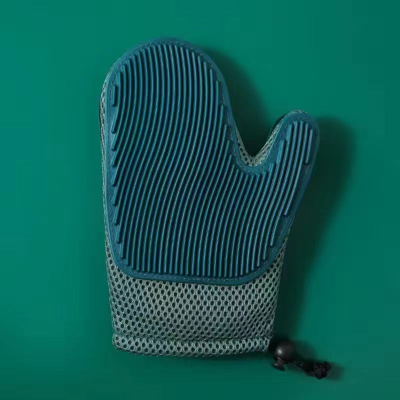 Soft pet massage glove for cats. Provides a soothing experience while grooming, promoting healthy circulation.