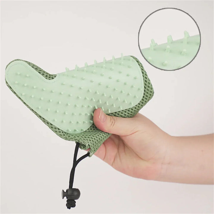 Essential cat care accessory: grooming glove for deshedding, massage & keeping your feline friend looking great.