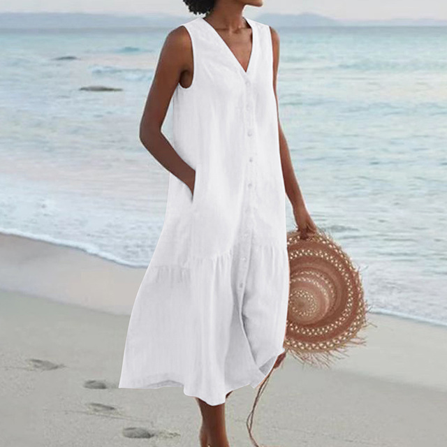 Comfortable women's sleeveless midi dress with a stylish v-neck and tiered skirt. Ideal for versatile summer outfits.