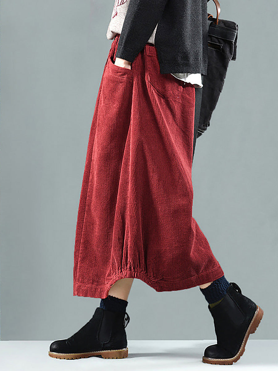 Versatile women's pleated maxi skirt with pockets & elegant button detail, ideal for all-season casual wear.