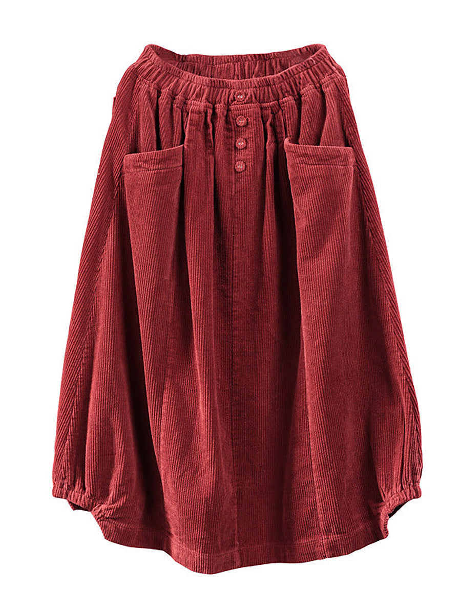 Chic women's flowy pleated maxi skirt featuring a button detail and convenient pockets, great for casual or work.