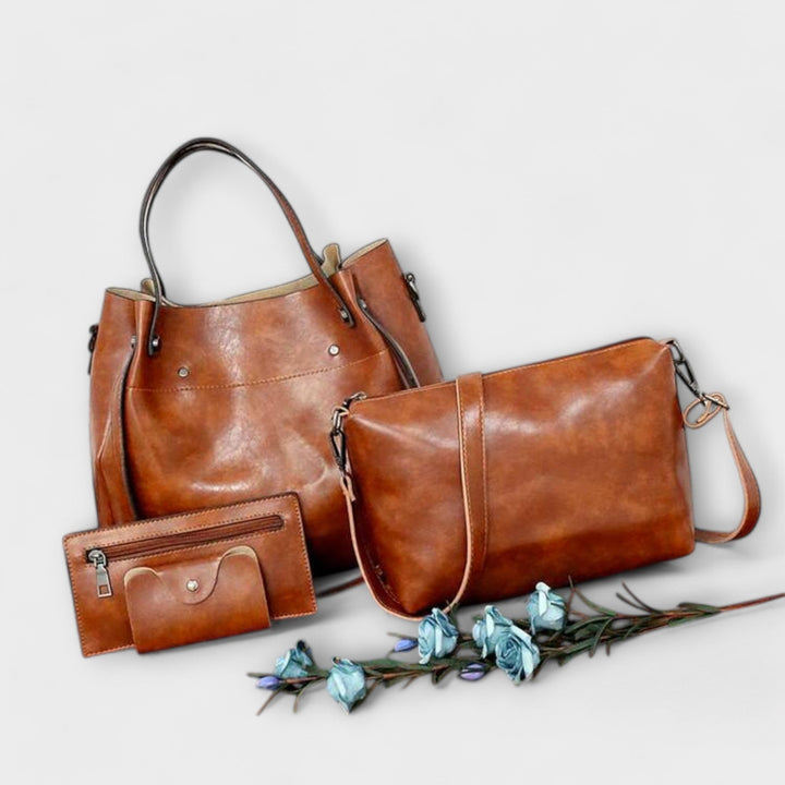 Women's 4 piece vintage style handbag set in brown. Elegant tote, shoulder bag, clutch & wallet.