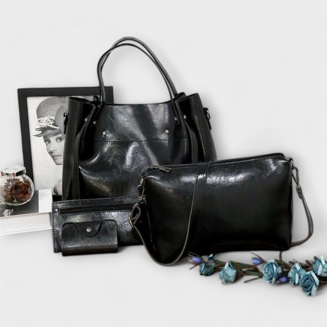 Vintage style brown women's handbag collection. Four pieces: tote, shoulder bag, purse, card holder.
