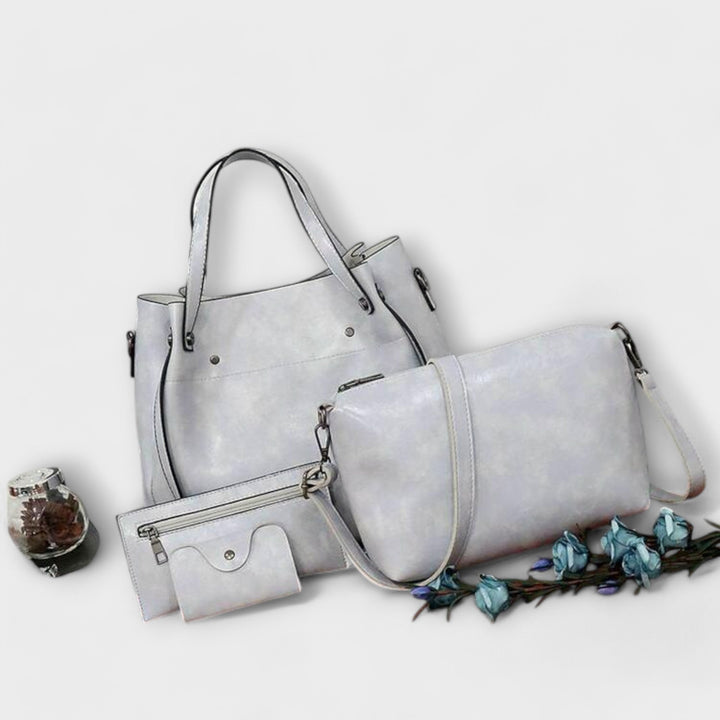 Red stylish vintage style 4 piece women's handbag set for various occasions. Tote, shoulder, clutch.