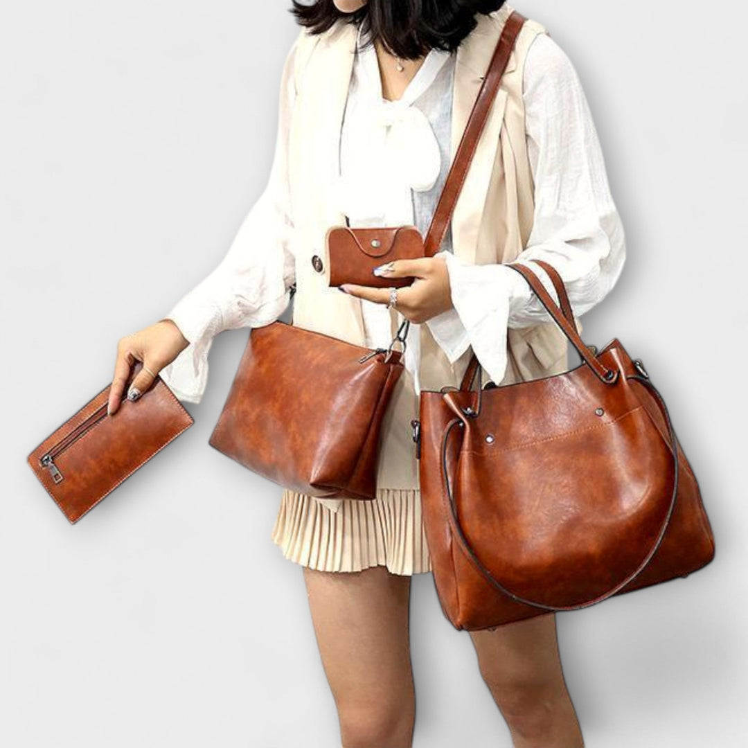 Stylish black 4 piece vintage handbag set. Versatile women's purse, tote, shoulder bag, clutch.