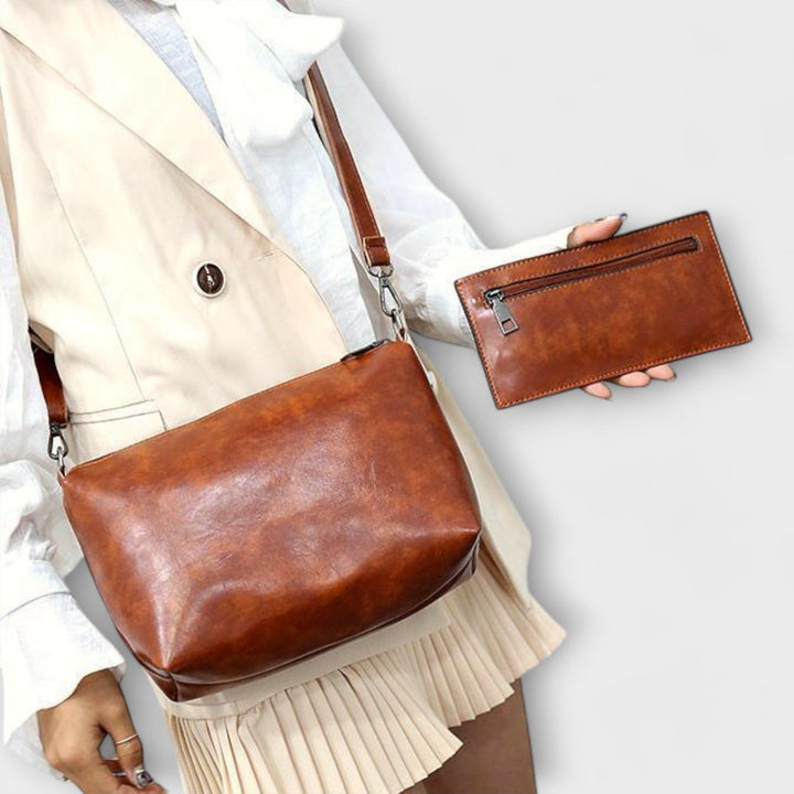 Black elegant 4 piece vintage handbag and purse set. Perfect for women's fashion accessories.