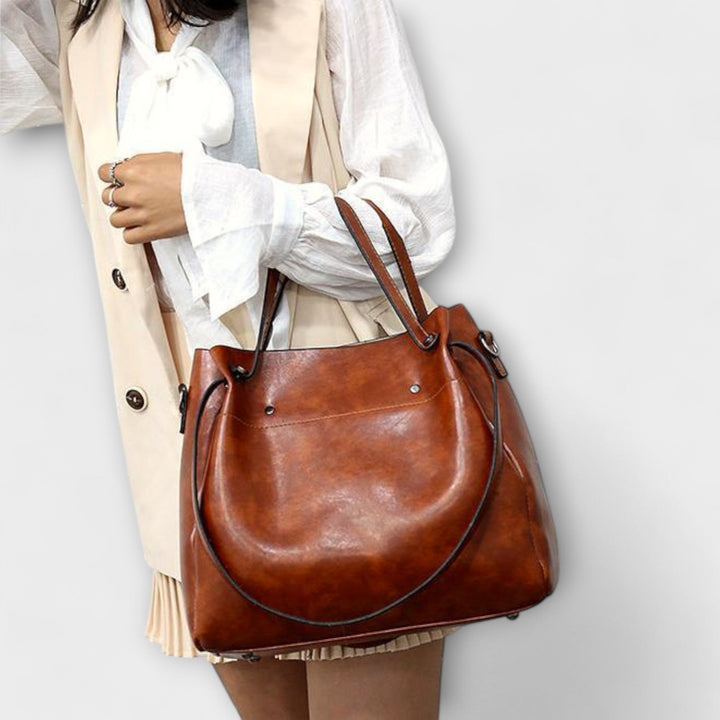 Red versatile women's vintage style bag set. Shoulder bag, tote, clutch, and small wallet included.