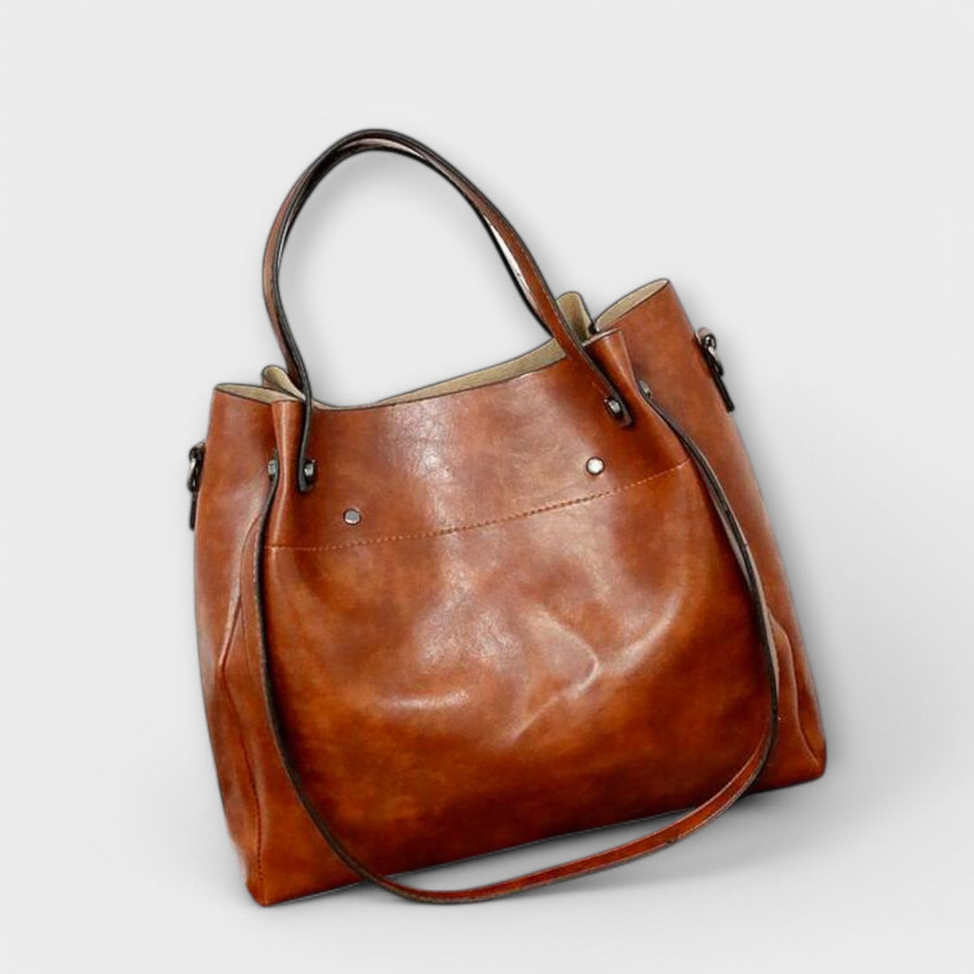 Brown women's vintage style handbag set. Includes large tote, shoulder bag, small purse & wallet.