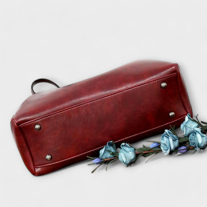 Brown 4-piece women's vintage handbag set, featuring a stylish tote, shoulder bag, and clutch.