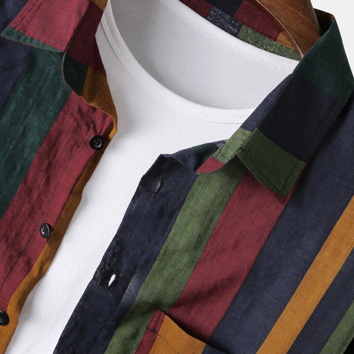 Stylish men's long-sleeve green striped shirt with a modern fit. Casual button-down, ideal for men's fashion.