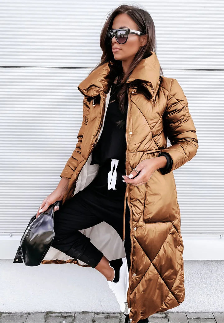 Detail of a women's warm quilted parka jacket. High-quality winter coat with stylish design for cold weather.