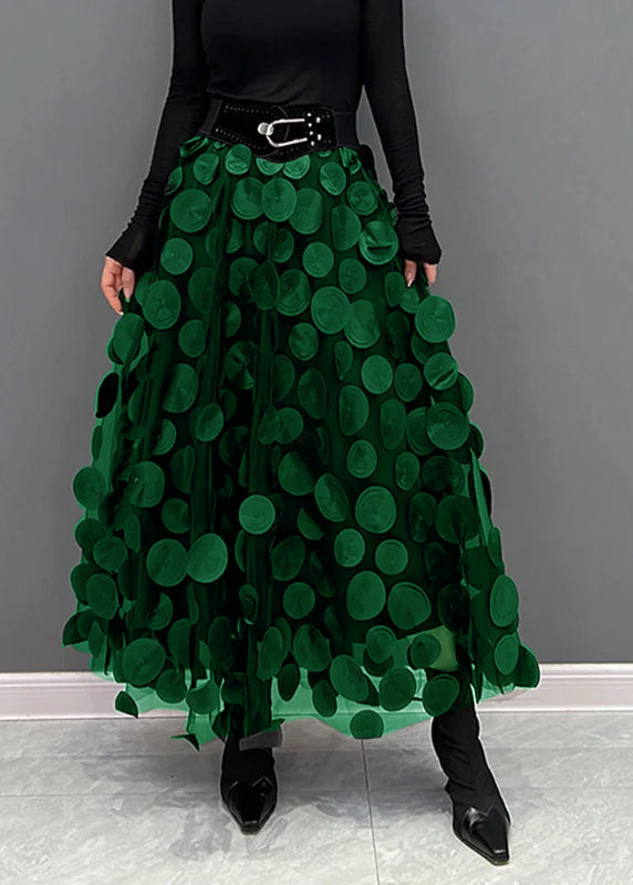 Texture of the women's polka dot patchwork skirt, highlighting quality fabric for elegant fashion.