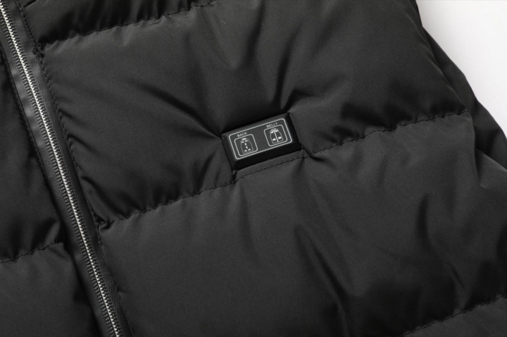 Stylish unisex heated jacket, offering practical adjustable warmth for any cold weather outfit.