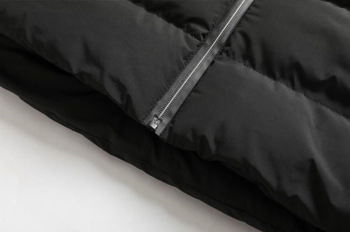 Lightweight, thermal unisex heated jacket, water-repellent & perfect for cold weather outdoor gear.
