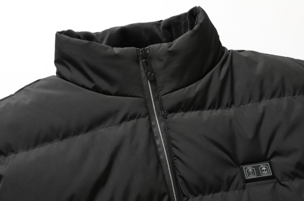 Premium unisex heated jacket, water-repellent & lightweight, ensuring warmth as essential outdoor gear.