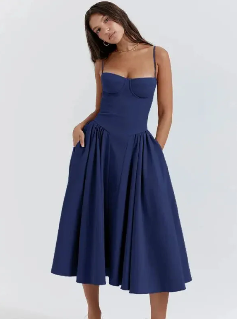 Chic women's sleeveless V-neck midi dress, ideal for summer beach wear or casual day outings.