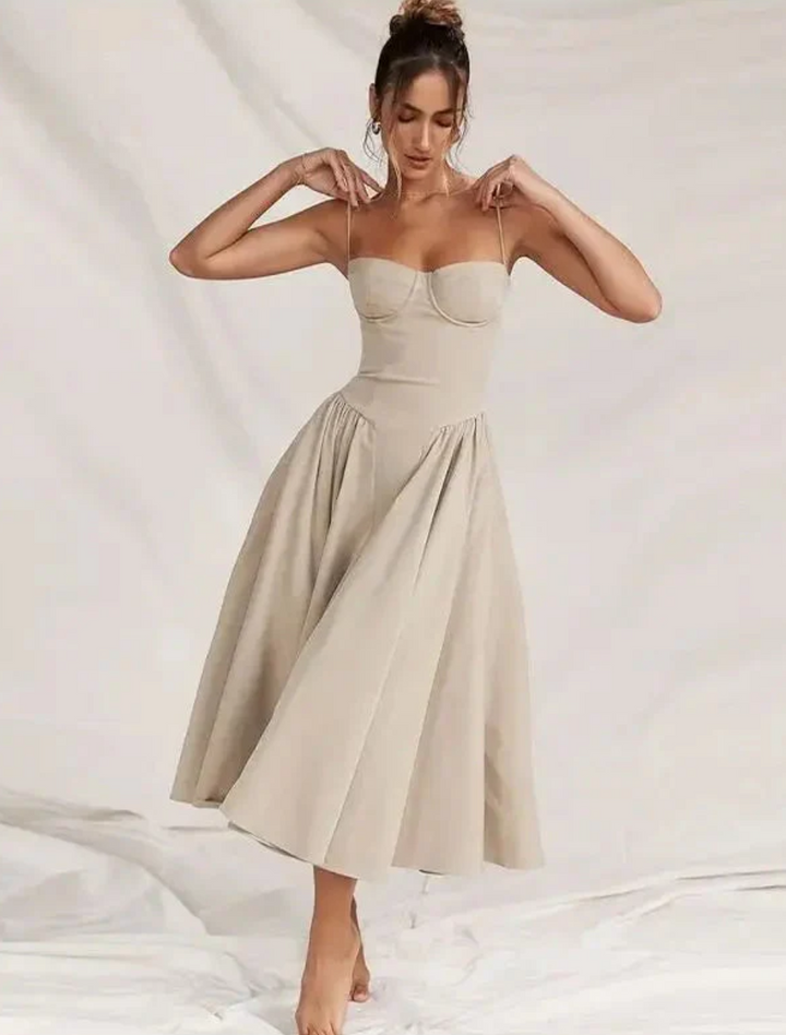 Women's V-neck casual midi dress, perfect for summer days or vacation. Effortless, flowy style.