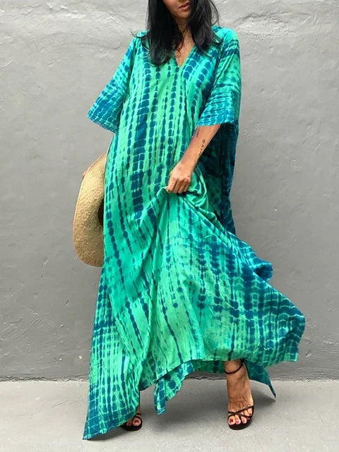 Women's flowy caftan maxi dress, perfect for effortless summer style & resort wear.