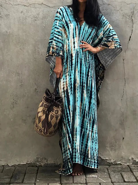 Women's summer caftan maxi dress, offering effortless style for vacation and resort outings.