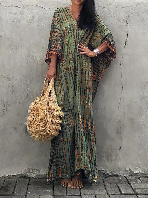 Lightweight women's caftan maxi dress, ideal for hot summer days, beach, and resort wear.