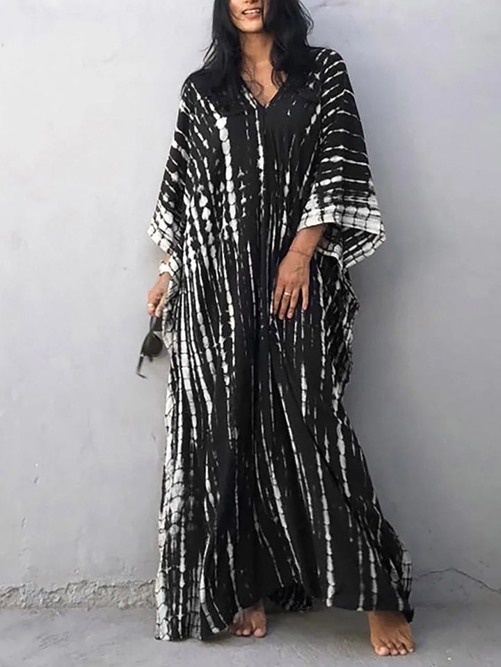 Women's loose-fit patterned caftan maxi dress, an essential for comfortable summer vacations.